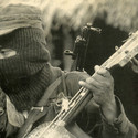 Ezln_music_and_gun_large