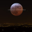 Red moon over Sheffield by thetworegs